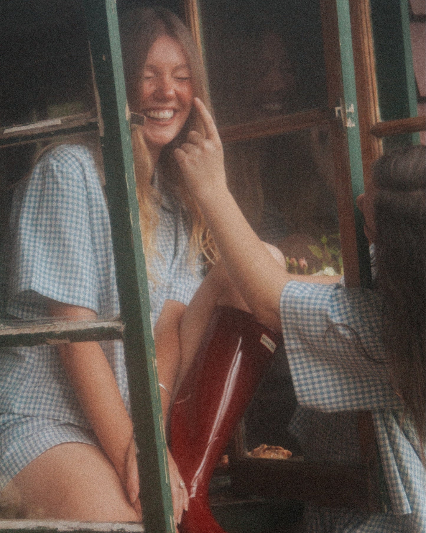 Woman Wearing the Blue Wren gingham pyjama set by Simply Provincial, handmade from 85 percent cotton and 15 percent linen. Inspired by the delicate Australian Blue Wren bird and crafted for comfort and timeless slow-fashion style.