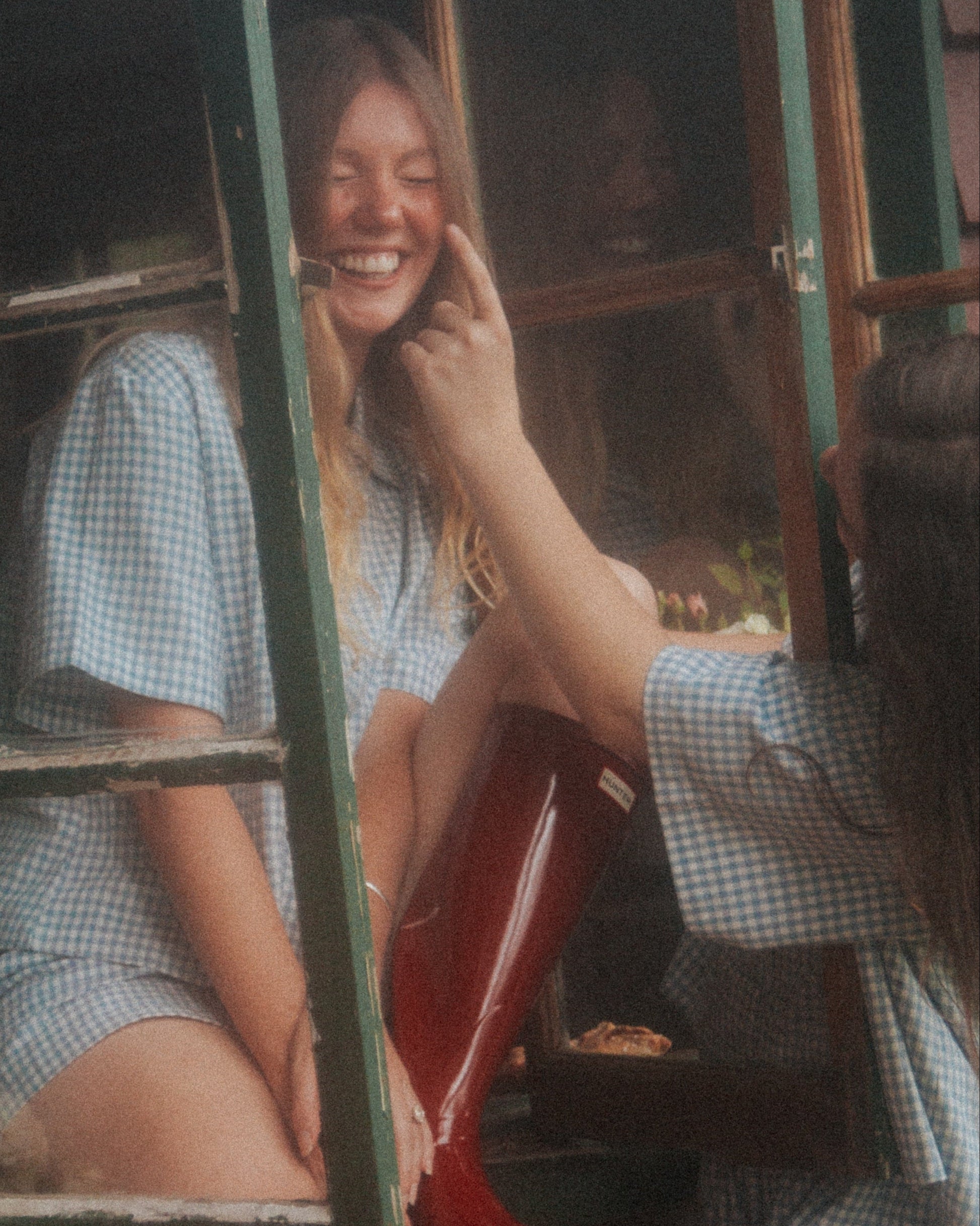 Woman Wearing the Blue Wren gingham pyjama set by Simply Provincial, handmade from 85 percent cotton and 15 percent linen. Inspired by the delicate Australian Blue Wren bird and crafted for comfort and timeless slow-fashion style. 